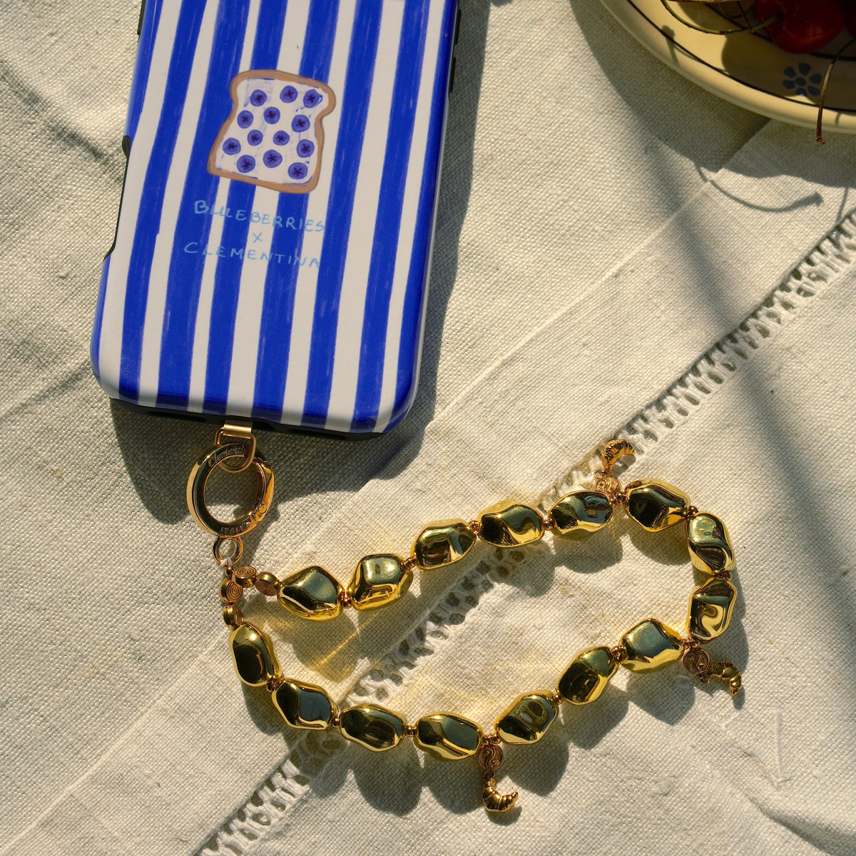 Gold Croissant - Phone charm